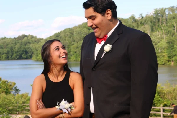 A man and woman posing for a picture.