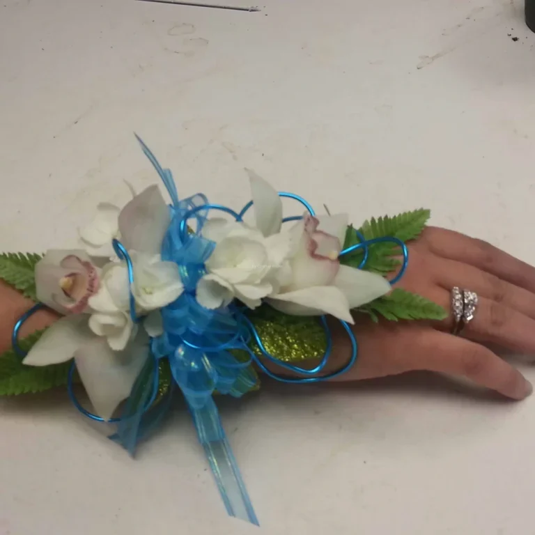 A hand with flowers and leaves on it