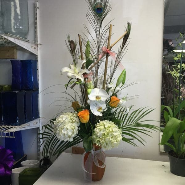 A vase filled with flowers on top of a table.