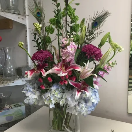 A vase filled with flowers on top of a table.