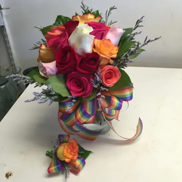 A bouquet of flowers sitting on top of a table.